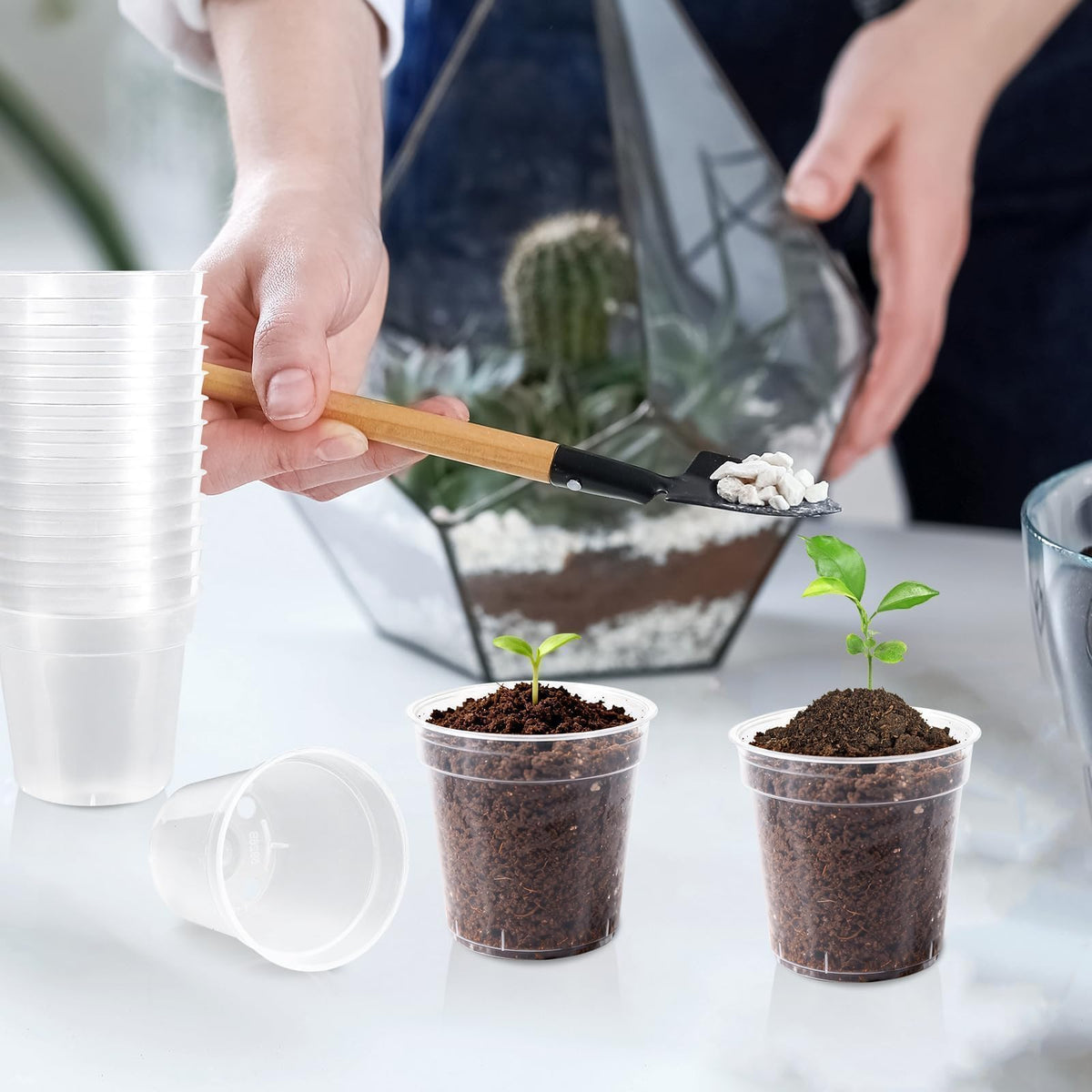 RXLWYUNLAE 120-pack seedling pots stacked for space-saving storage.