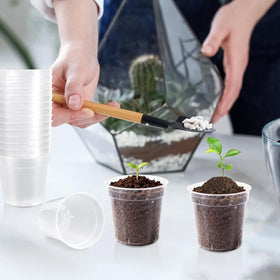RXLWYUNLAE 120-pack seedling pots stacked for space-saving storage.