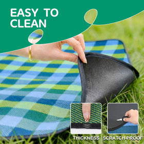 RYCHIC waterproof blanket at a concert for comfortable seating.