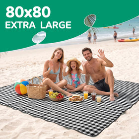 RYCHIC foldable picnic mat neatly packed in its carry bag.