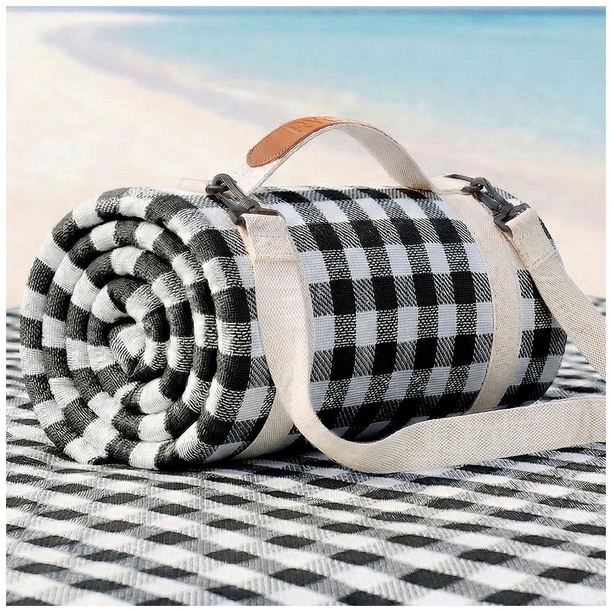 RYCHIC waterproof beach blanket on sand with family enjoying a sunny picnic.