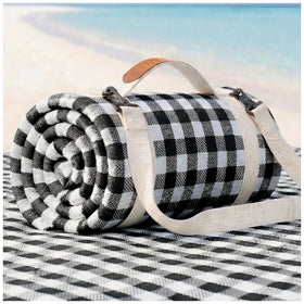 RYCHIC waterproof beach blanket on sand with family enjoying a sunny picnic.
