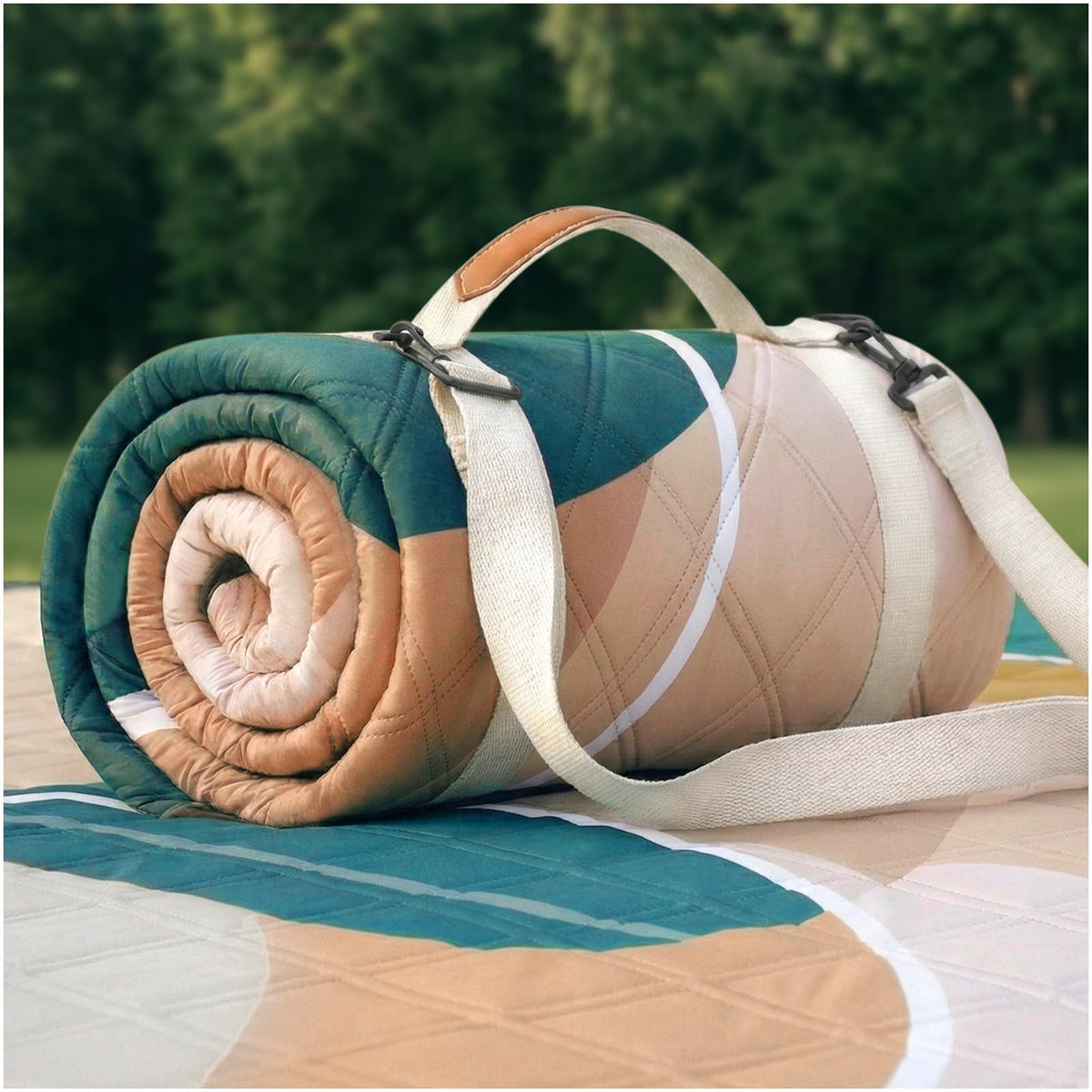 RYCHIC waterproof picnic blanket on grass for damp outdoor picnics.