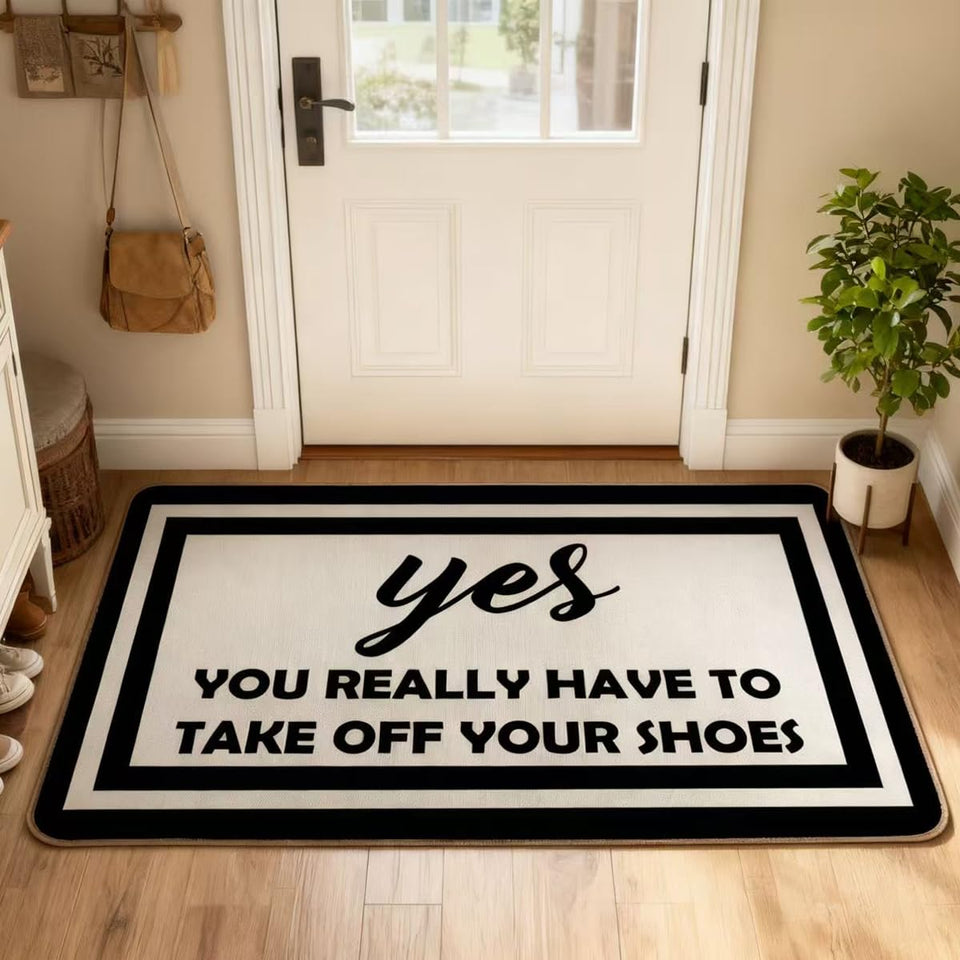 RYKEEN Welcome door mat 17x30 gray with non-slip backing for a safe entry.