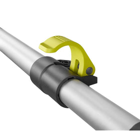 RYOBI brush head in action removes grime from windows and fences safely.