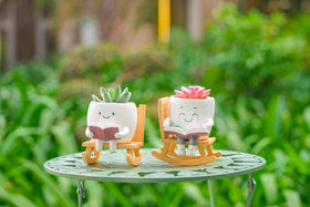 RZOIKZOI white rocking-chair planter for indoor and outdoor setups