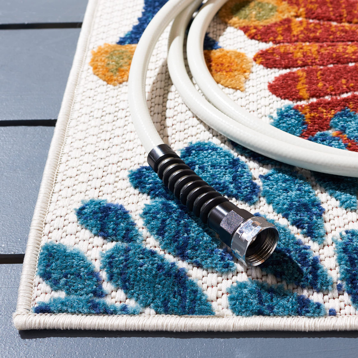 Safavieh Cabana polypropylene rug, simple hose-down cleaning after outdoor use.