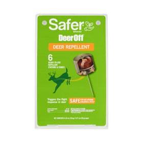Safer Brand Deer Off station hanging on a fence deters deer from the yard