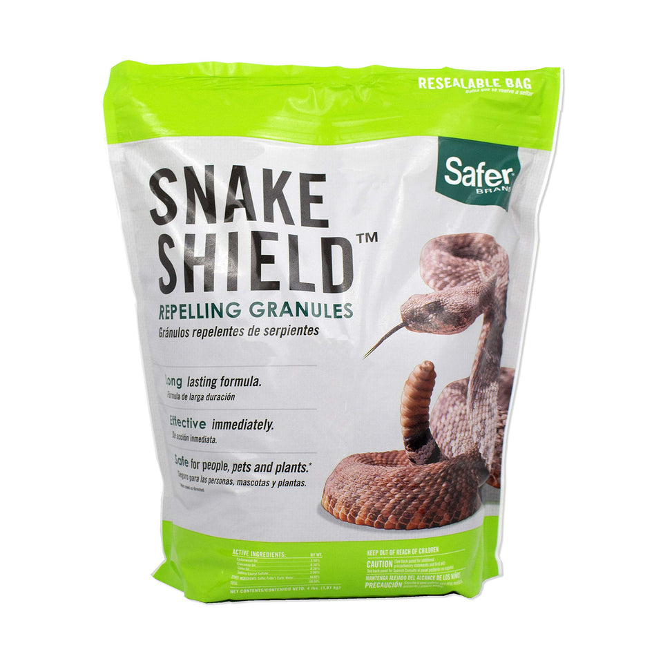 Safer Brand Snake Shield granules applied around a garden perimeter for deterrence