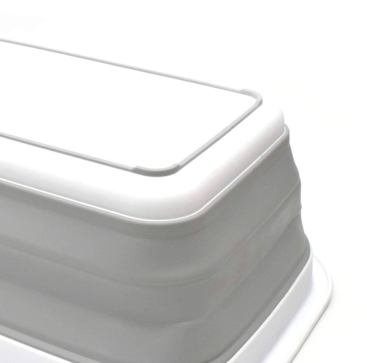 SAMMART collapsible wash basin tucked in car trunk after camping.