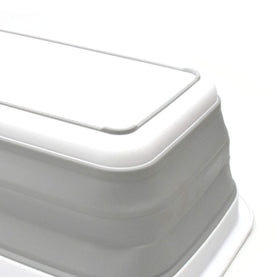 SAMMART collapsible wash basin tucked in car trunk after camping.