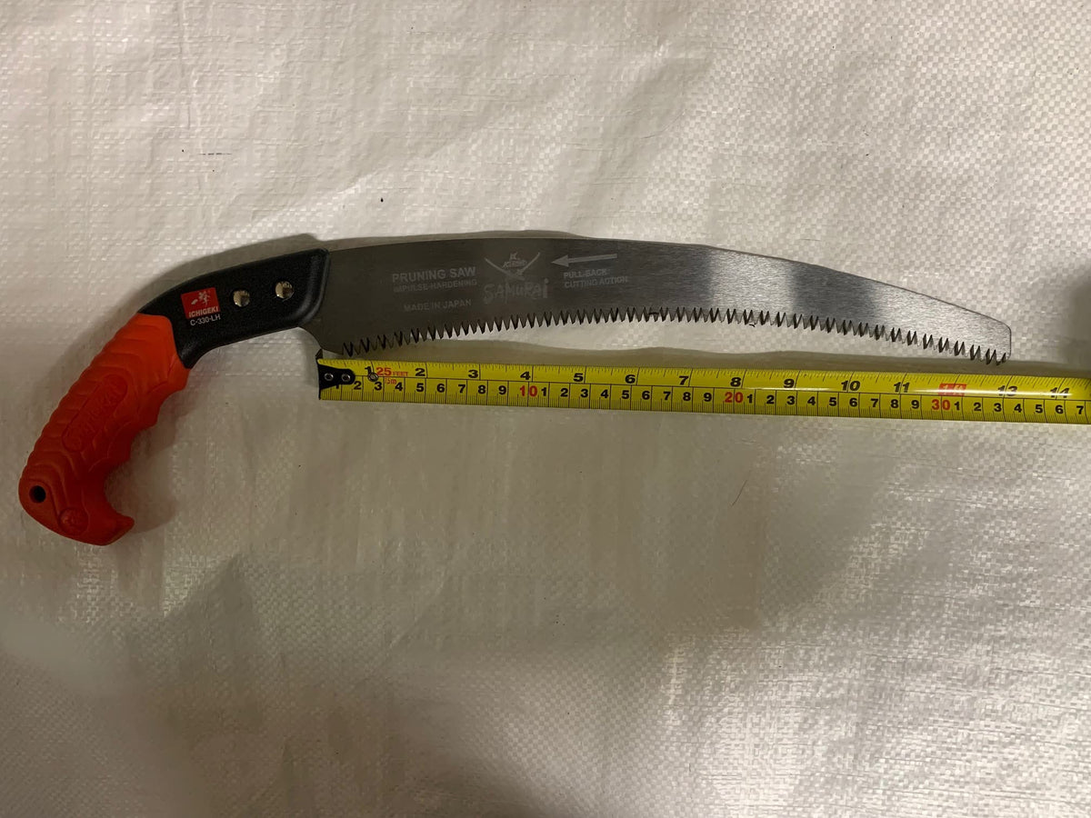 SAMURAI Kanzawa Ichigeki orange pruning tool ready for quick access.