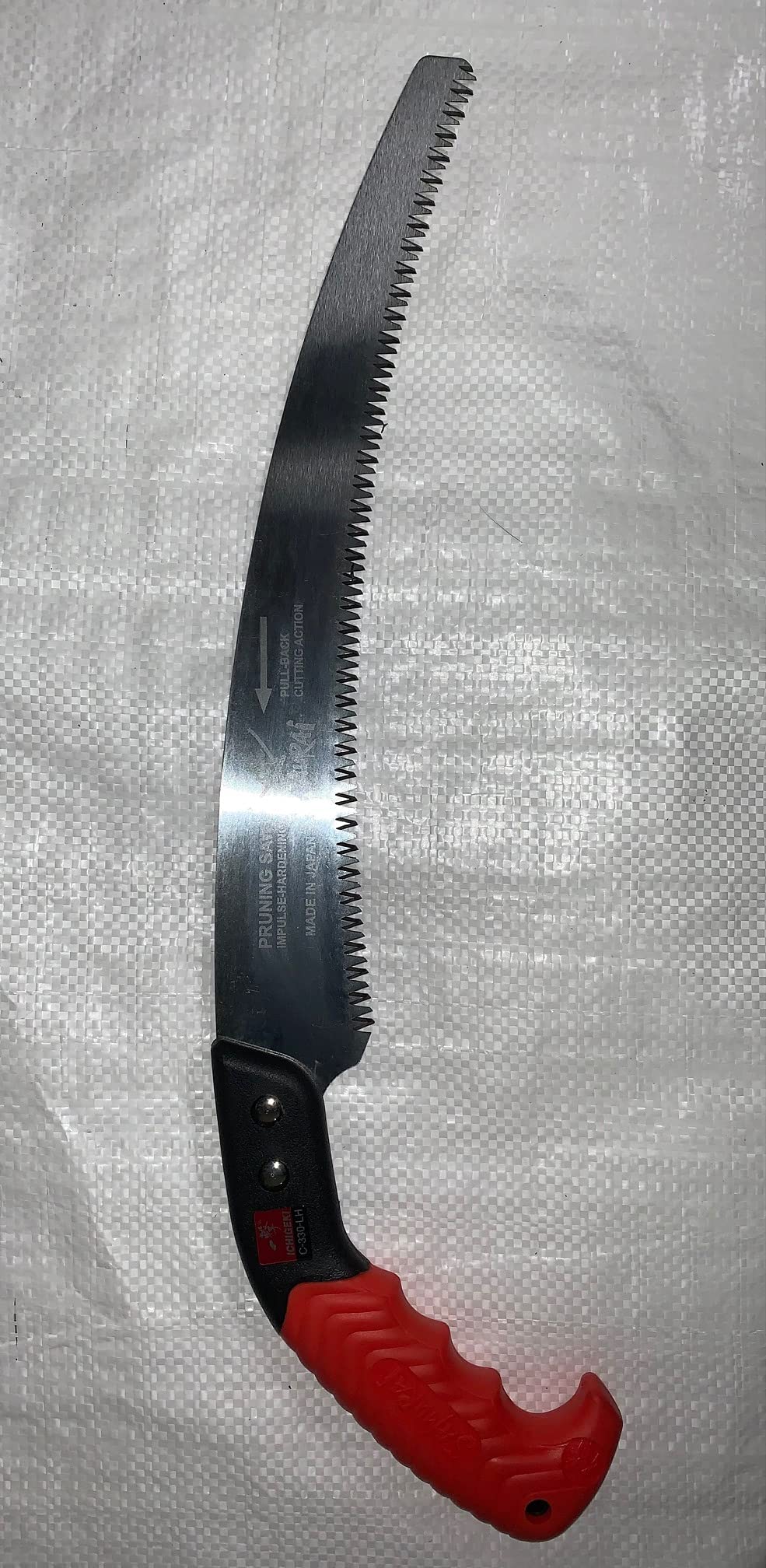 SAMURAI Kanzawa Ichigeki sheath with belt clip for safe transport.