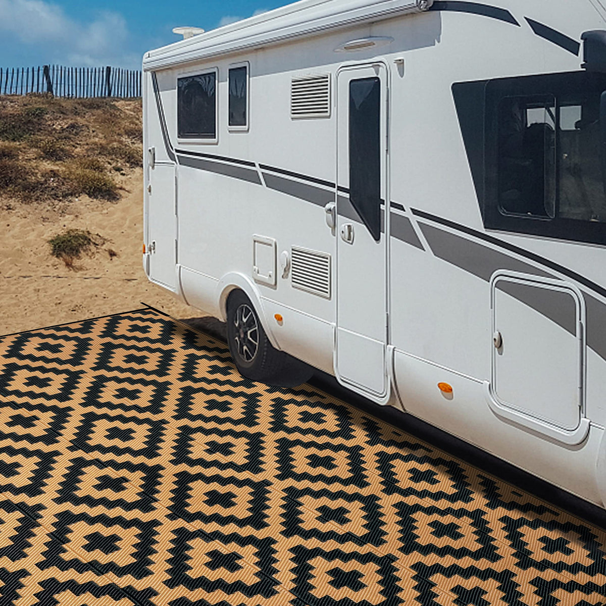 SAND MINE camping picnic rug packed in carrying bag for travel.