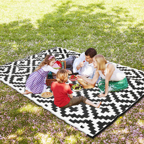 SAND MINE outdoor rug easily cleaned and portable for travel.
