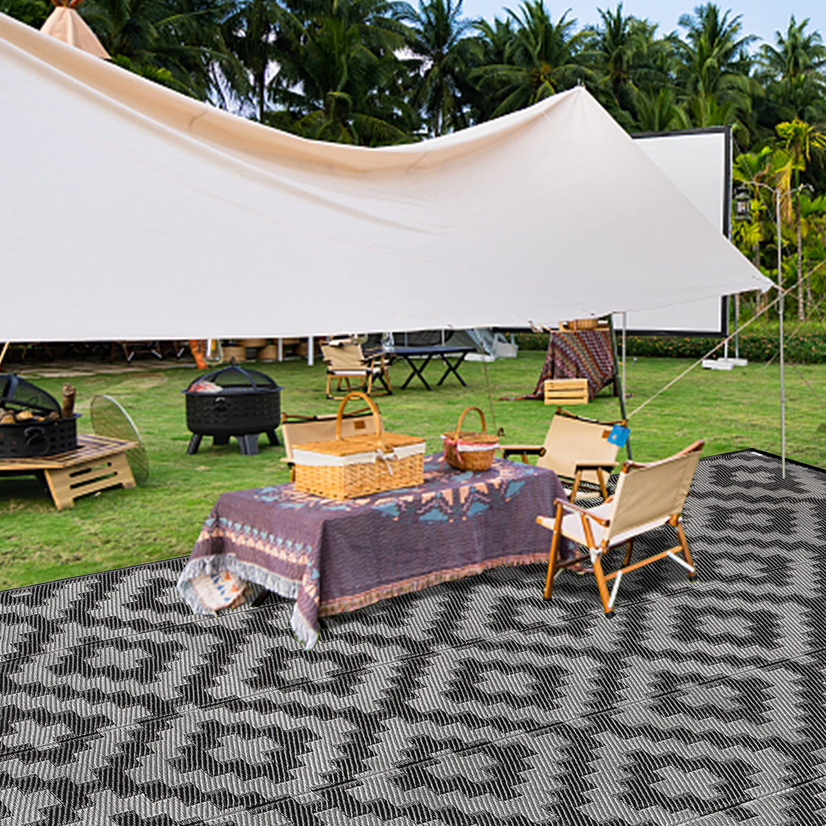 SAND MINE rug includes corner loops and stakes for secure outdoor setup.