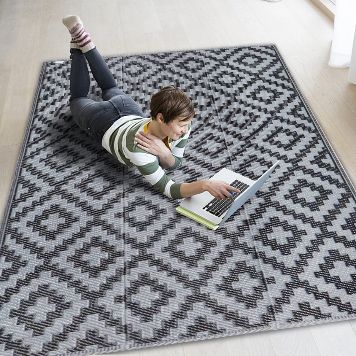 SAND MINE waterproof outdoor rug on patio with furniture for durable outdoor style