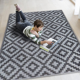 SAND MINE waterproof outdoor rug on patio with furniture for durable outdoor style