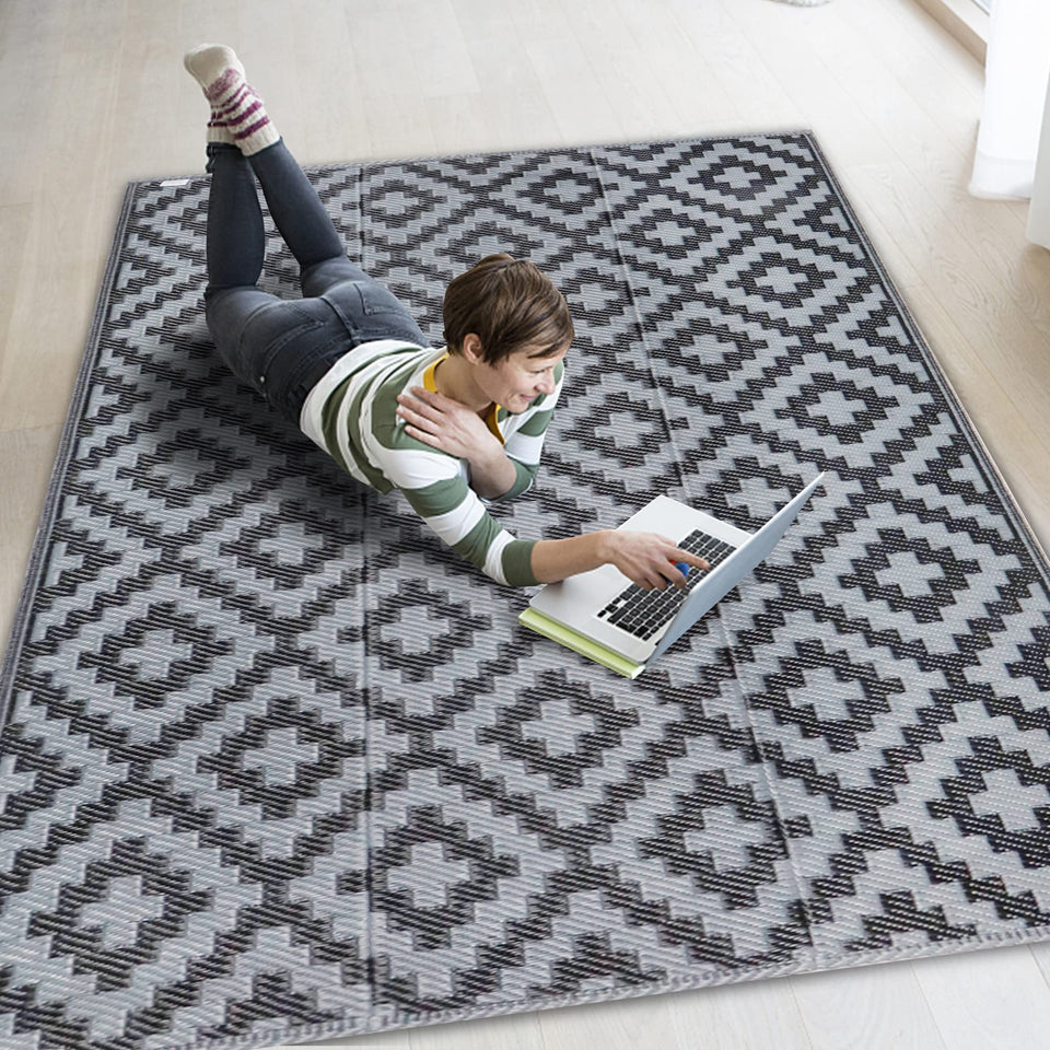 SAND MINE waterproof outdoor rug on patio with furniture for durable outdoor style