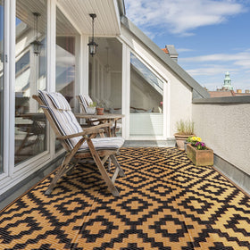 SAND MINE outdoor rug 4x6 reversible design on patio for stylish outdoor seating