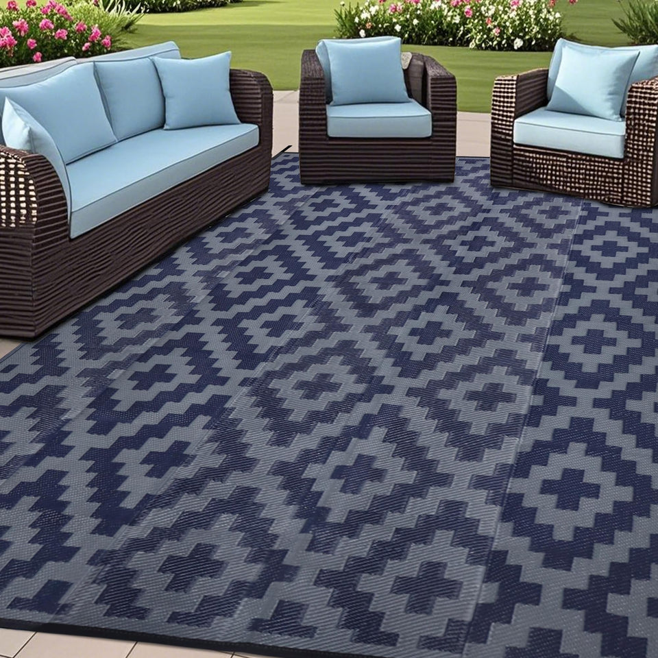 SAND MINE reversible mats in blue-grey lattice for stylish outdoor patios.