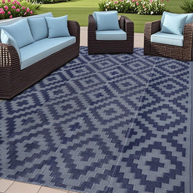 SAND MINE reversible mats on blue-grey lattice for versatile outdoor use