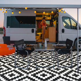 SAND MINE outdoor rug ideal for RV camping and beach trips.