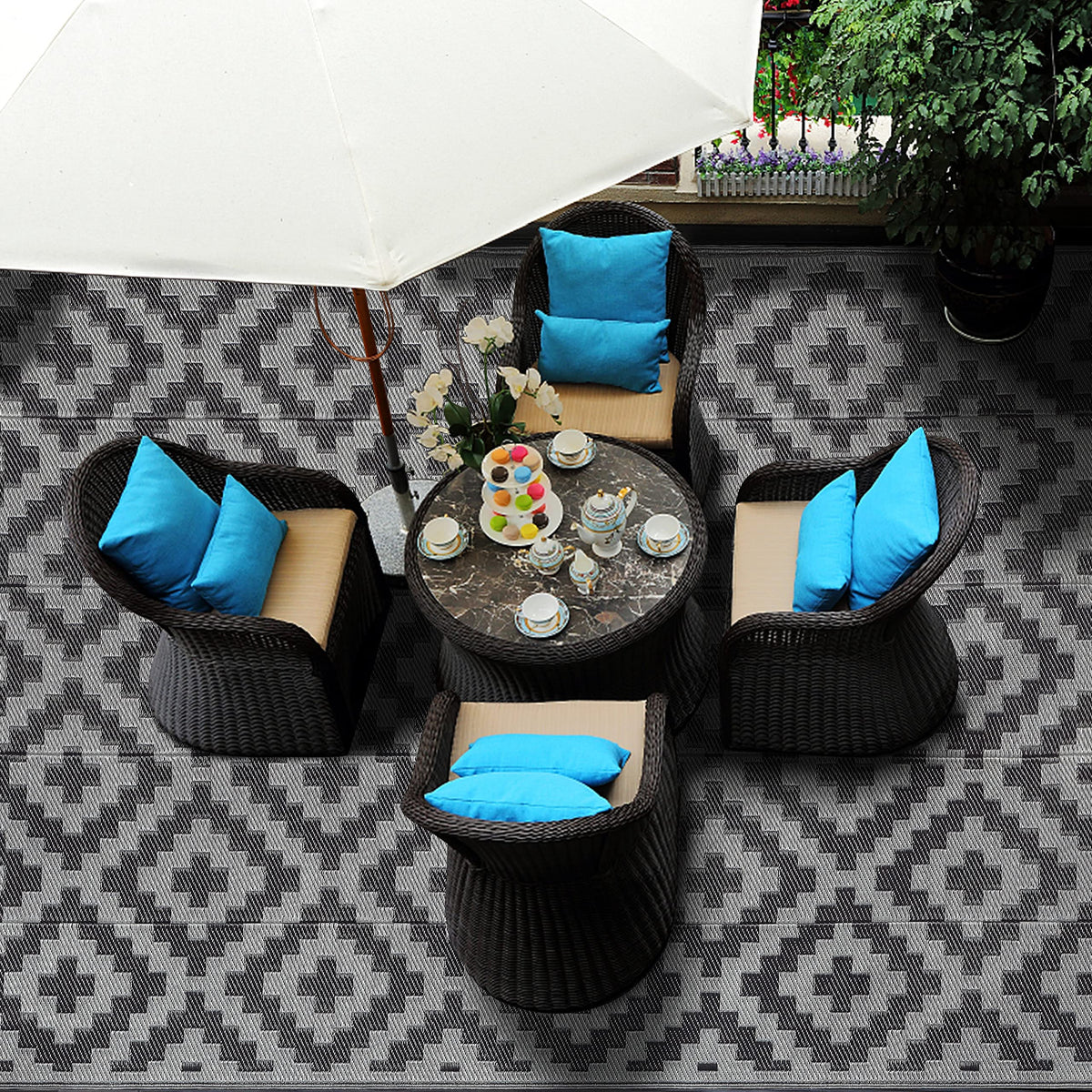 SAND MINE versatile outdoor rug fits patios decks beaches and camping trips.