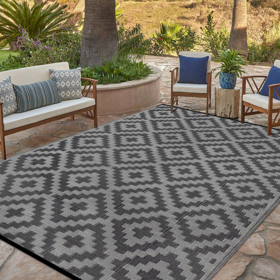SAND MINE waterproof outdoor rug in black grey lattice, ideal for patios and decks.