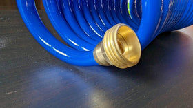 SANFU PU Recoil Hose with brass fittings for quick outdoor connections.