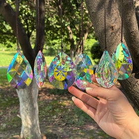 SANPLMG 6Pcs crystal sun catcher prisms brighten windows with rainbow reflections.