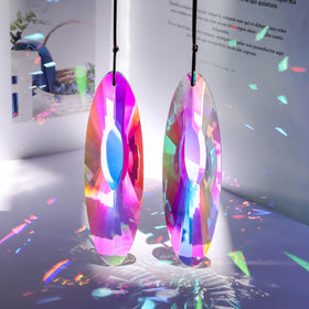 SANPLMG Multi-faceted prisms scatter light into vibrant room-wide rainbows.