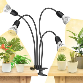 SANSI four-head grow light setup provides balanced coverage for indoor seedlings.