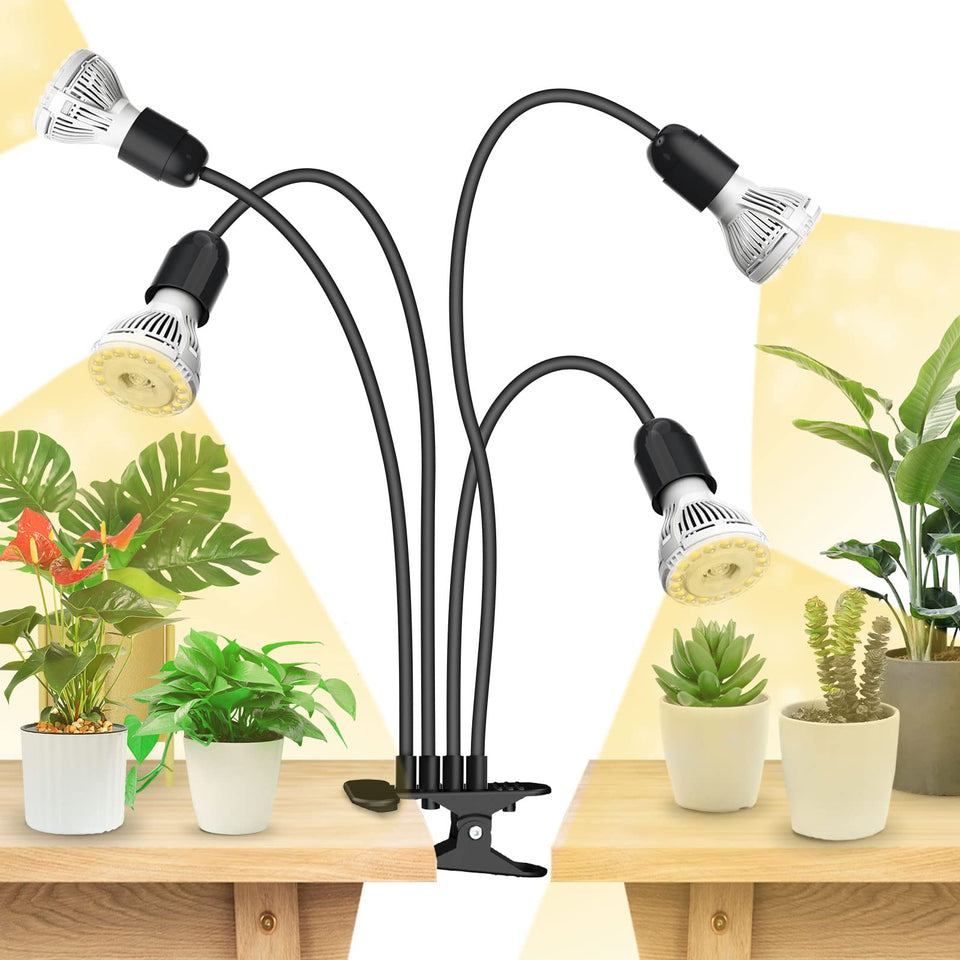 SANSI four-head grow light setup provides balanced coverage for indoor seedlings.