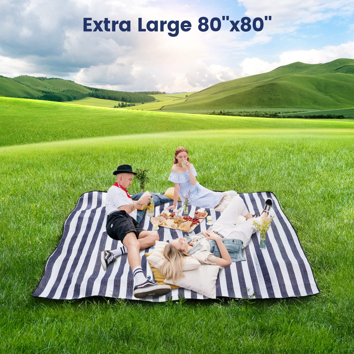 Sapsisel picnic blanket spread on park grass for seating.