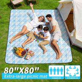 Sapsisel picnic blanket soft cotton middle layer adds comfortable seating on grass.