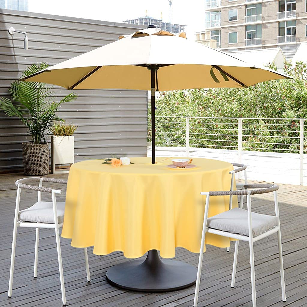 SARAFLORA round yellow tablecloth protects surfaces from spills while brightening any gathering.