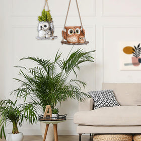 Saysmile Swing Owl Planter outdoors on patio showcases weather-resistant resin