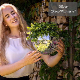 SCANDINORDICA disco ball planter with macrame hanger adds boho style and flexible display.
