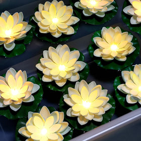 Scawim 5-inch floating lotus light with warm white glow for pool decor.