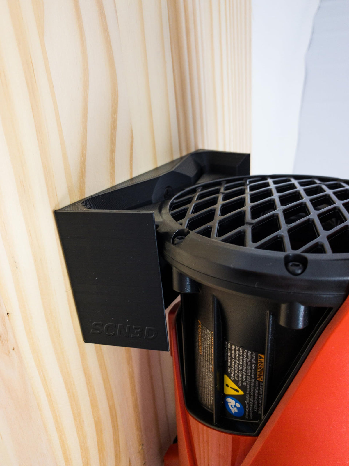 American-made SCN3D wall mount supporting Milwaukee M18 Fuel blower
