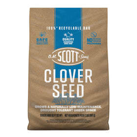 Scotts Clover Seed being spread to start a low-maintenance lawn.