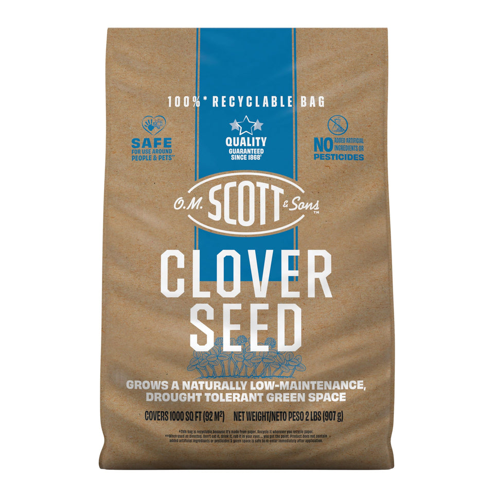 Scotts Clover Seed being spread to start a low-maintenance lawn.