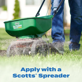 Fall application of Scotts Halts on lawn to prevent moss and cool-season weeds