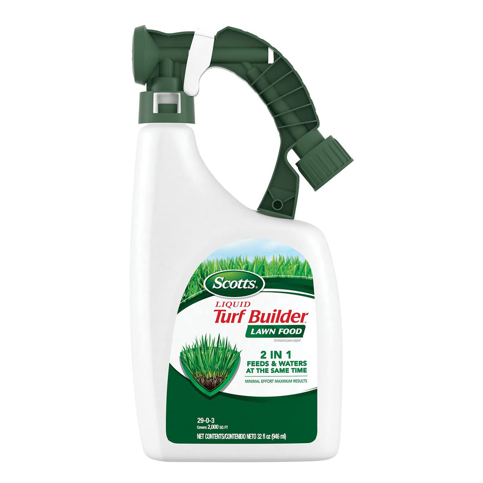 Scotts Liquid Turf Builder Lawn Food bottle attached to hose for easy lawn feeding.