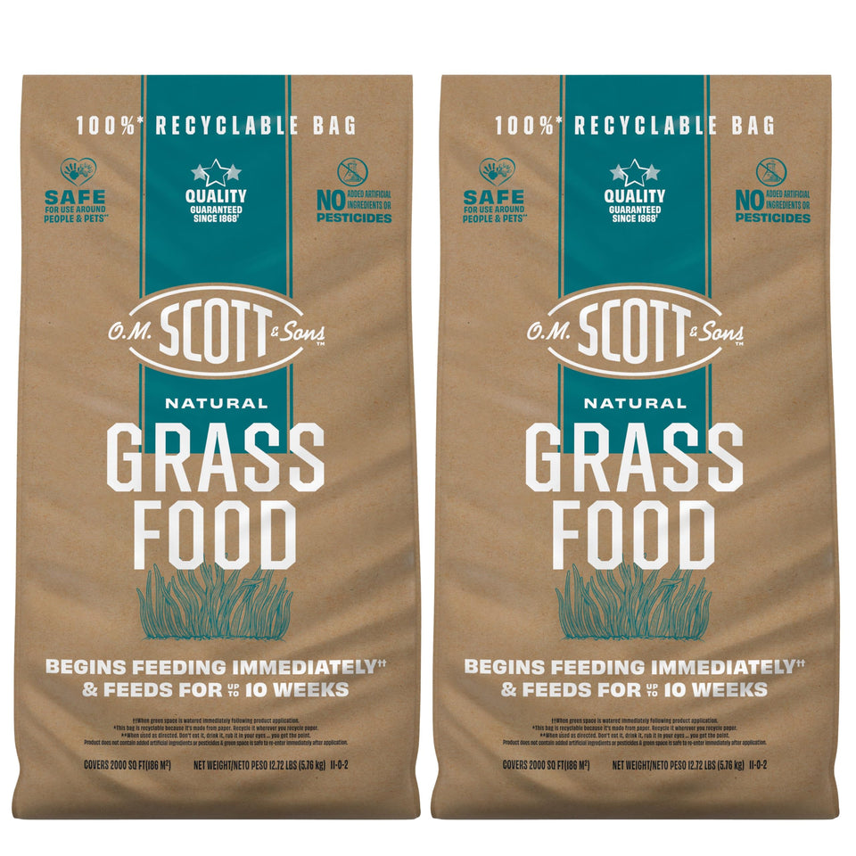 Scotts Natural Grass Food bag shown, supports even growth across lawns.