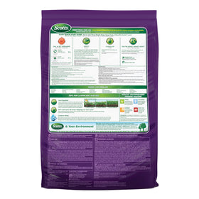 Homeowner applying weed and feed in spring supports healthier lawn.