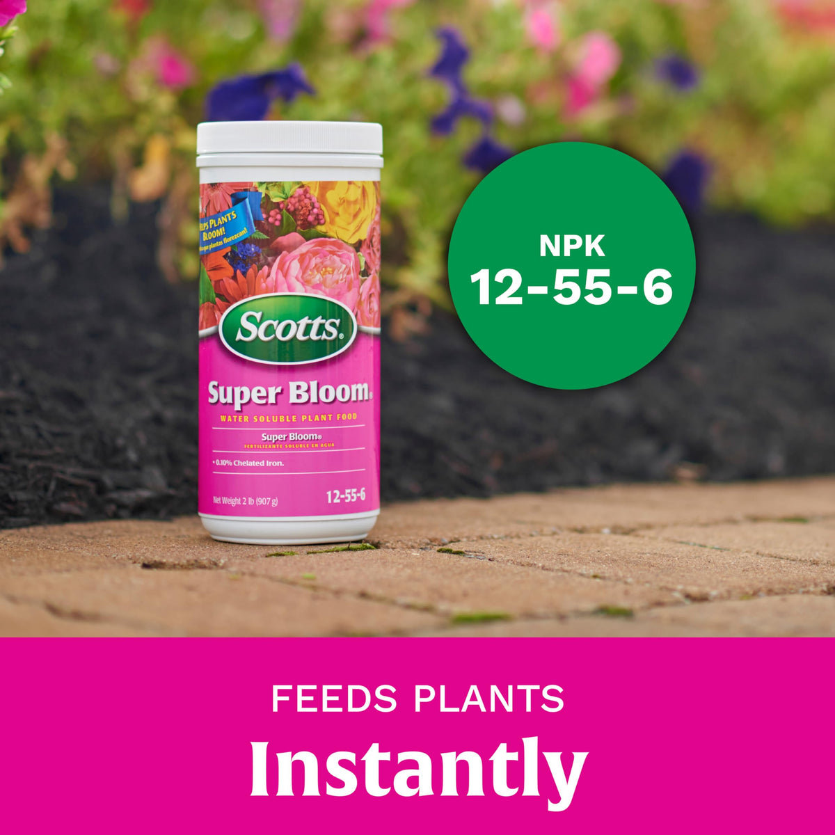 Scotts Super Bloom bed-area application nourishes bed flowers and fruiting plants.