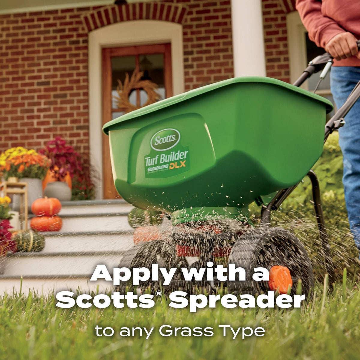 Scotts WinterGuard Fall Lawn Food being lightly watered to enhance absorption
