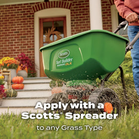 Scotts WinterGuard Fall Lawn Food being lightly watered to enhance absorption